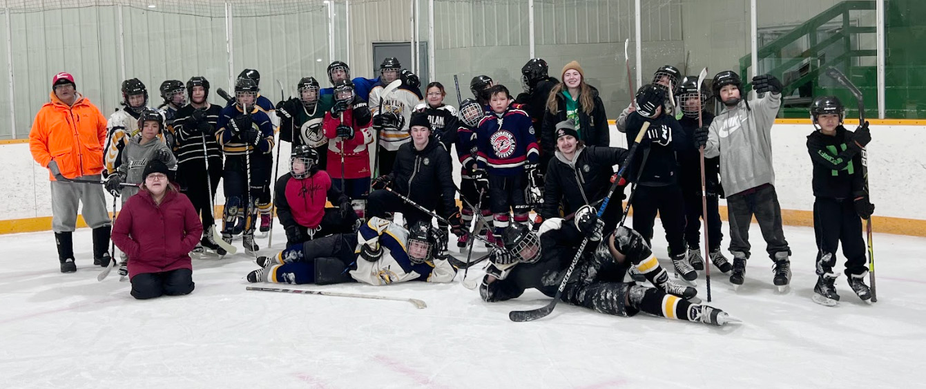 Sandy Lake youth on the ice for a group photo.