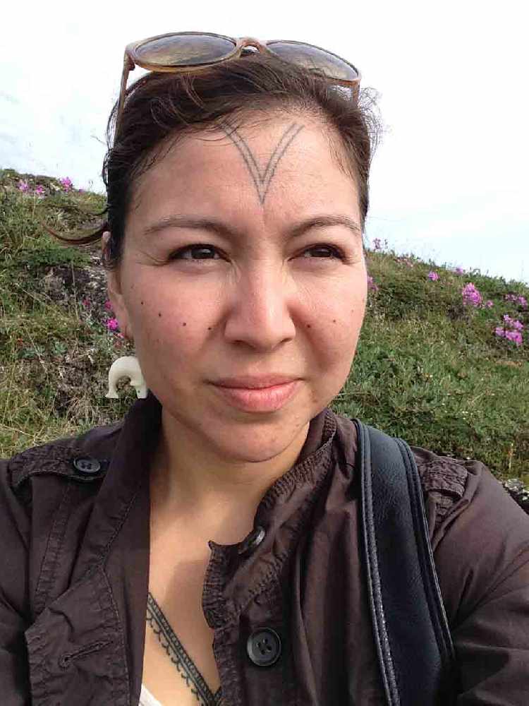 In Alaska Indigenous Women Are Reclaiming Traditional Face Tattoos  Vogue