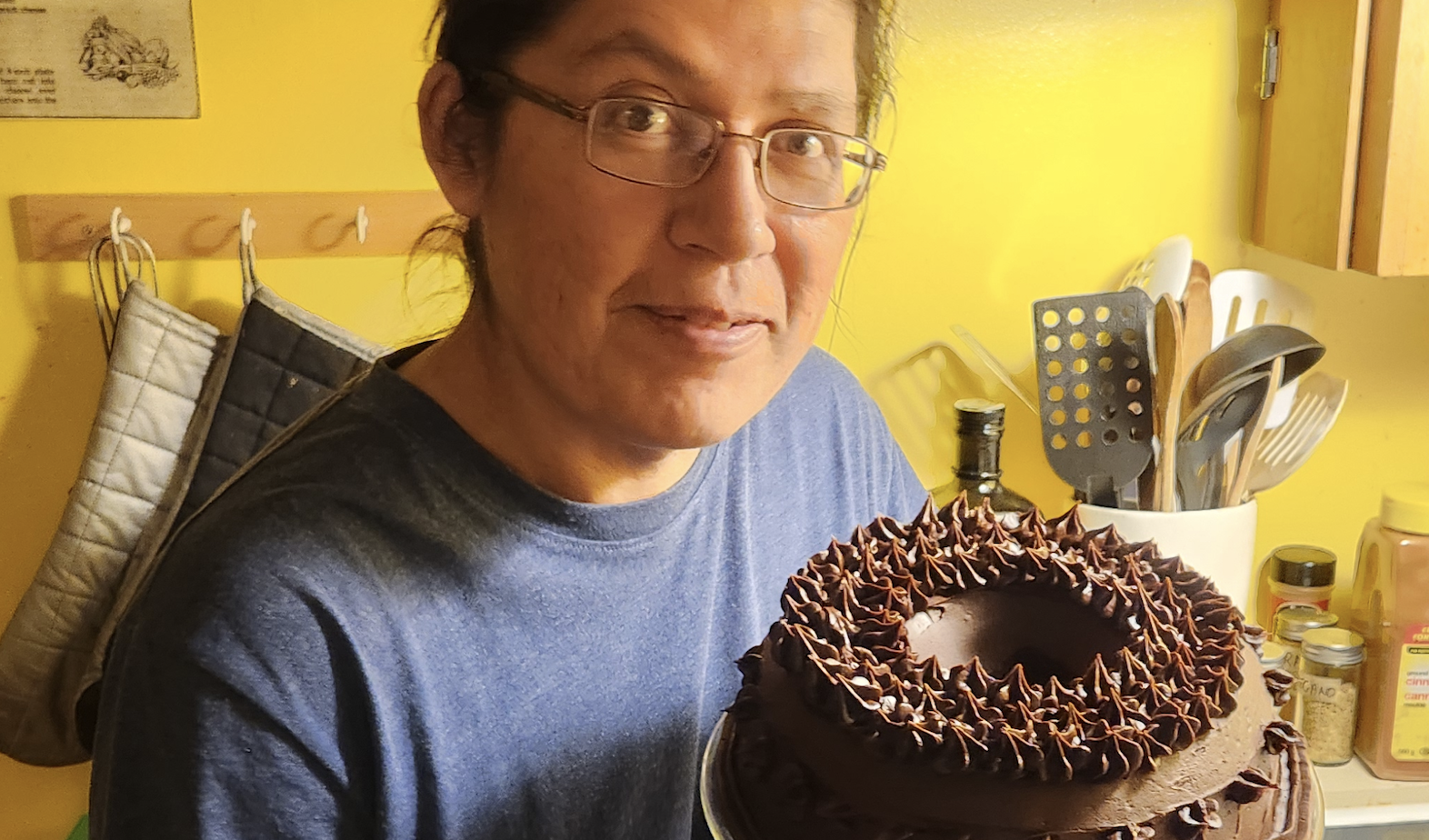 Xavier Kataquapit and his chocolate cake.