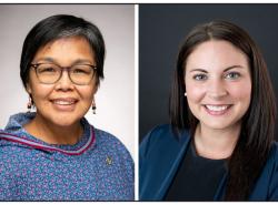 At left is a woman wearing a traditional Inuit dress. At right is a woman in a blue suit jacket. Both are smiling for the photos.