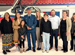 Chief Evan Taypotat (in uniform) joins members of his family